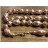 Image 2 : 38" strand necklace of 13.7-13.9 mm pink baroque Freshwater cultured pearls with a gold-plated clasp