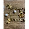Image 2 : 8" Gold-plated sterling silver bracelet Tagliamonte with 4 faux pearl drops and 5x mask charms.  - A