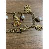 Image 3 : 8" Gold-plated sterling silver bracelet Tagliamonte with 4 faux pearl drops and 5x mask charms.  - A