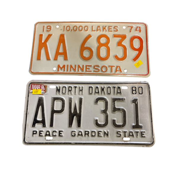 2 Vintage License Plates: Minnesota "KA 6839" (1974) and North Dakota "APW 351" (1980)