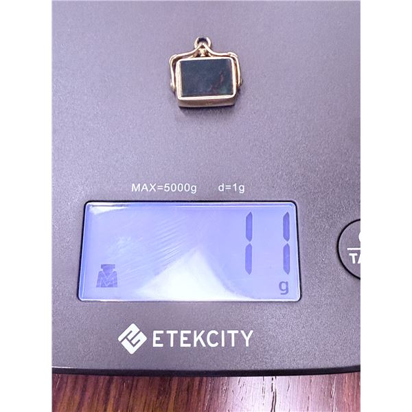 18 Karat Gold Framed Stone Pendant