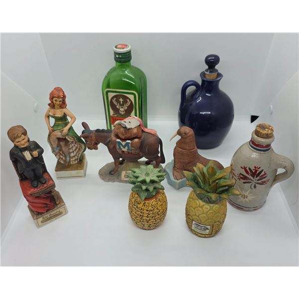Group of 9 Porcelain Figural Mini Decanters, Ceramic Jug, & 0.35L Jägermeister Bottle - Majority are