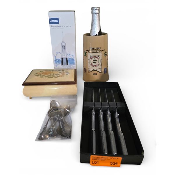 64 Grams of Sterling Spoons (some enamel), Set of Steak Knives, Musical Jewel Box, Oral Irrigator &