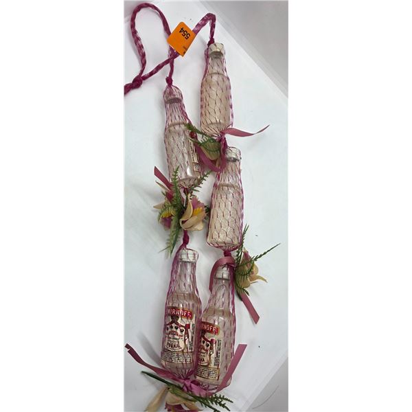 String of 5 x 50ml Smirnoff Vodka  - All sealed, but there is a great deal of evaporation