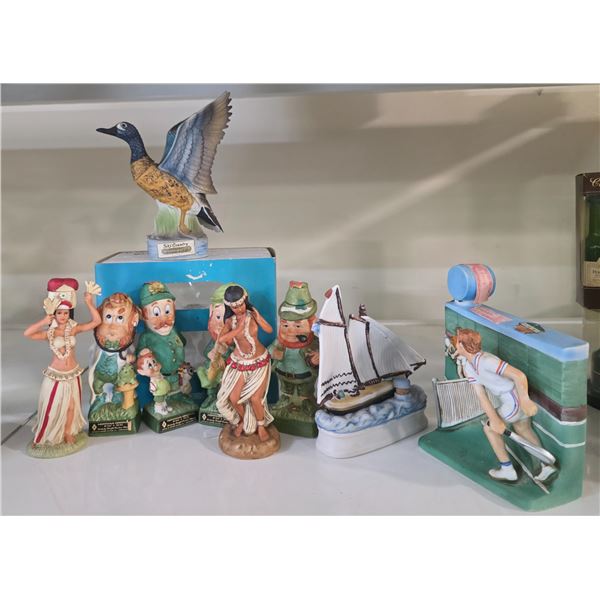 9 Piece Lot of Vintage Ski Country, Hoffman Bros, & Haas Bros Porcelain Liquor Decanters - Tallest i