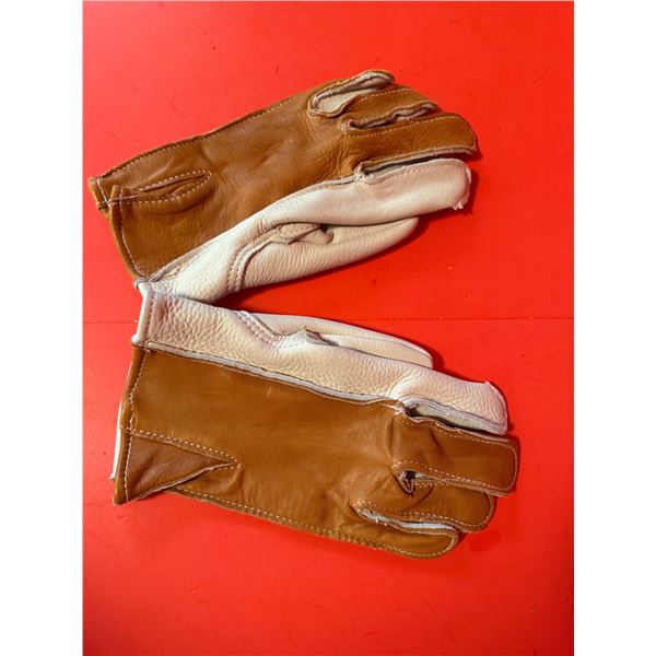 pair of tan leather riding gloves