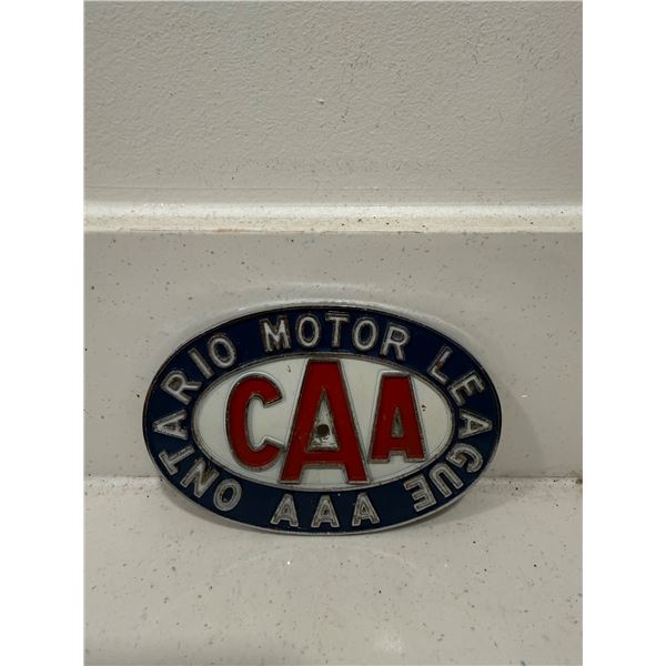 Ontario Motor League (OML) CAA AAA car badge.