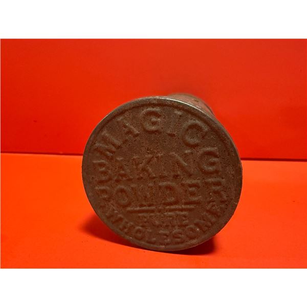vintage metal baking powder tin, likely from the Magic Baking Powder Brand