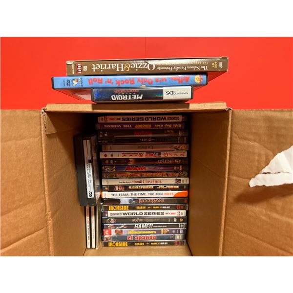 collection of DVDs and a Nintendo DS game