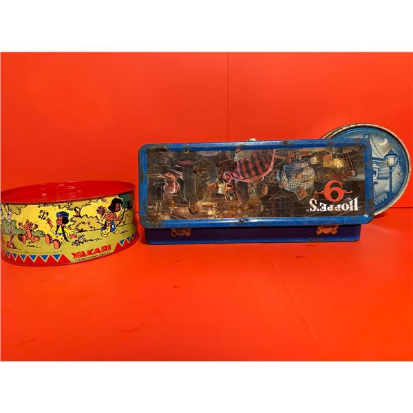 several vintage collectible tin boxes.