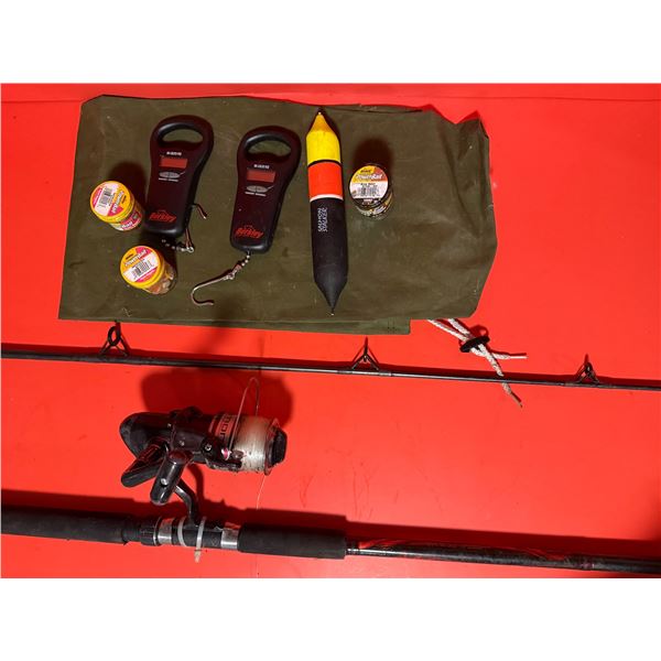 collection of Berkley-branded fishing tools and bait, including two digital scales, soft bait