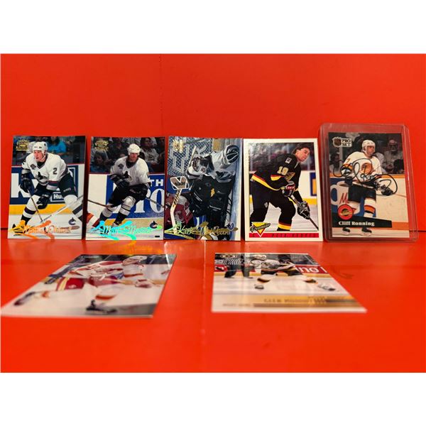 7 Hockey cards mostly Canucks one signed authenticity unknown