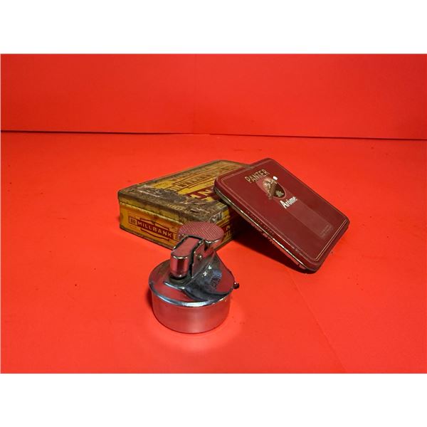 two vintage tobacco tins and a vintage lighter