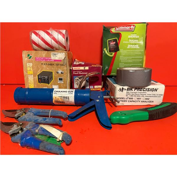 collection of various household and outdoor tools and products