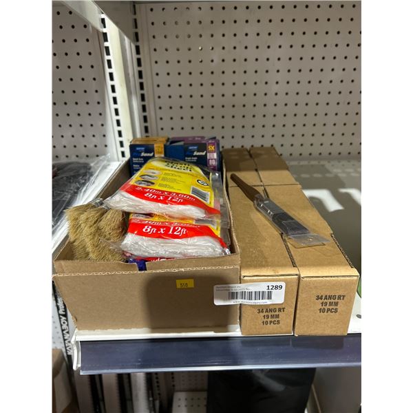 Lot of Paint Tools and Supplies Including Brushes, Sanding Sponges, and a Drop Sheet