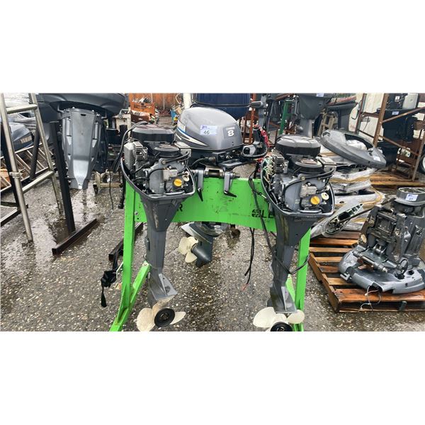 (2) YAMAHA 9.9 HP OUTBOARD MOTORS & (1) YAMAHA 8 OUTBOARD MOTOR ON PORTABLE MOTOR STAND *UNKNOWN