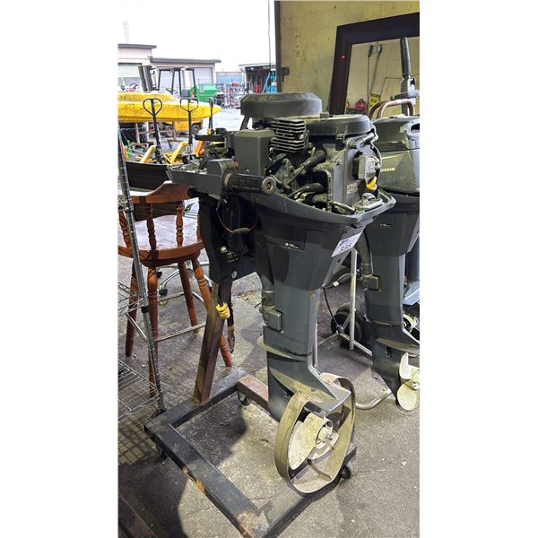 YAMAHA FOUR STROKE OUTBOARD MOTOR ON MOBILE STAND *UNKNOWN WORKING CONDITION*