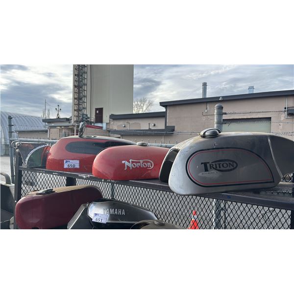 SHELF OF ASSORTED MOTORCYCLE FUEL TANKS
