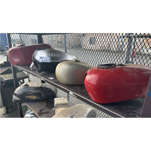 SHELF OF ASSORTED MOTORCYCLE FUEL TANKS