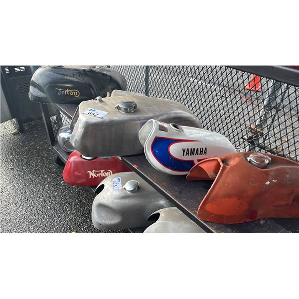 SHELF OF ASSORTED MOTORCYCLE FUEL TANKS
