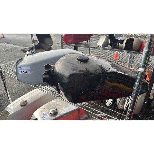 SHELF OF ASSORTED MOTORCYCLE FUEL TANKS