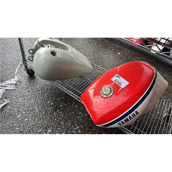 SHELF OF ASSORTED MOTORCYCLE FUEL TANKS