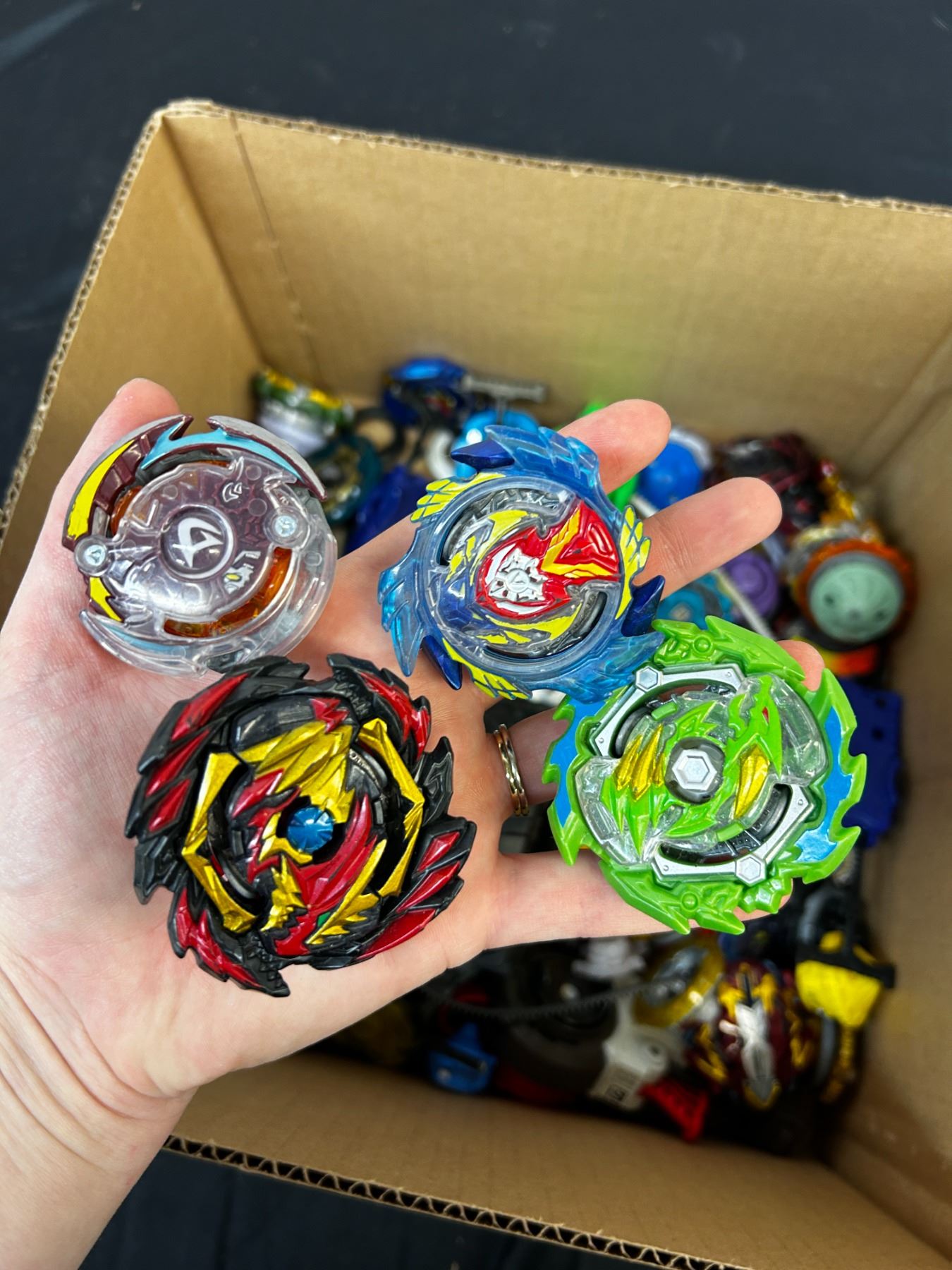 Box of Beyblades and Rip Cords