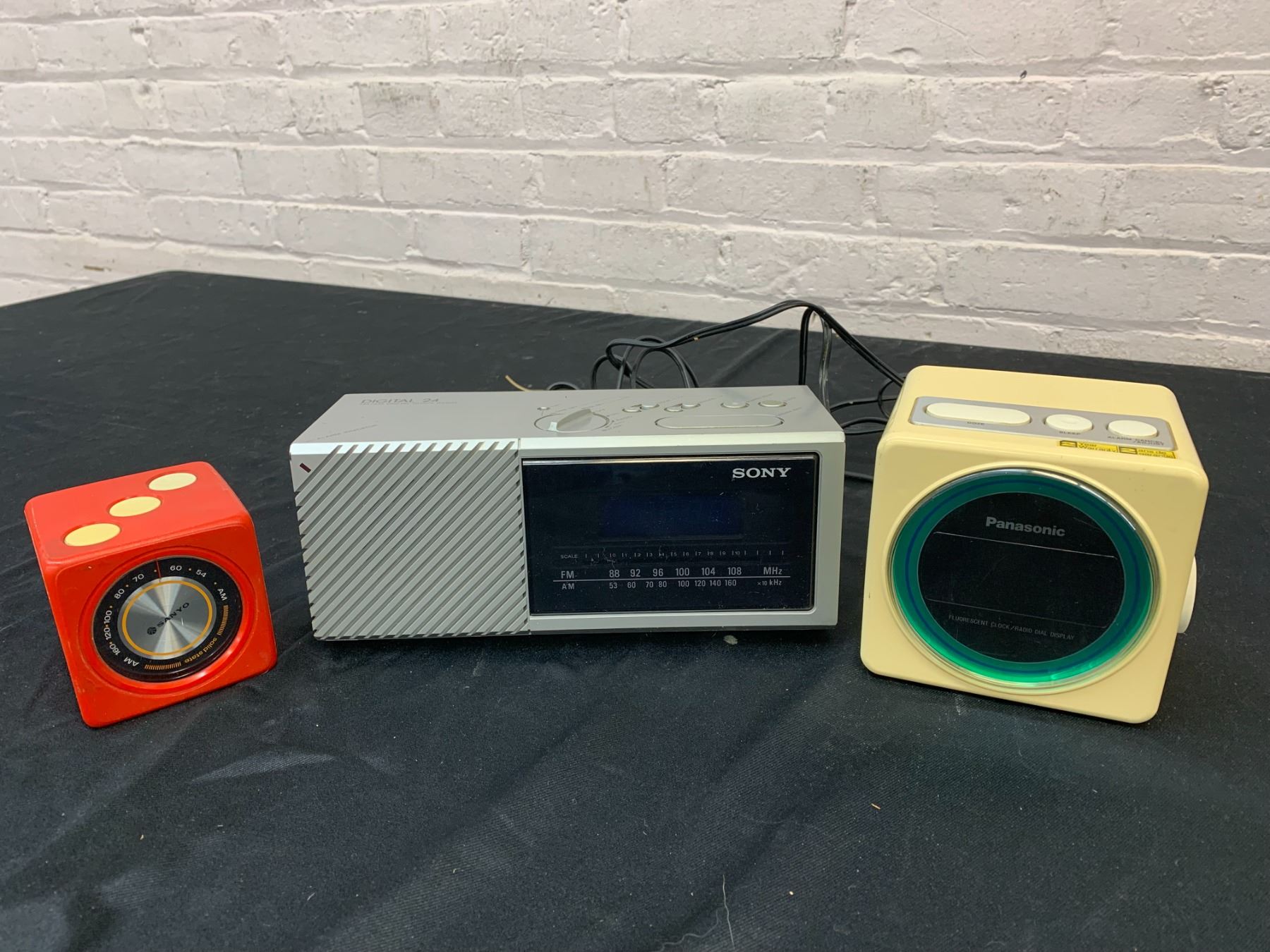 Lot of 3 Desktop Alarm Clock Radios SONY, Panasonic and Red Dice Square ...