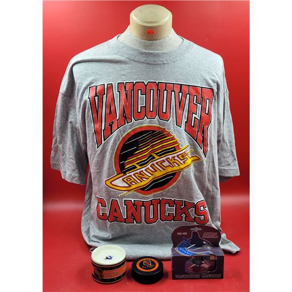 Canucks Collectibles Lot w/ T-Shirt, Action Camera, & 2 Official Game Pucks