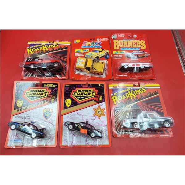 Lot of Sealed Diecast Vehicles w/ Road Champs, Road Kings, & More