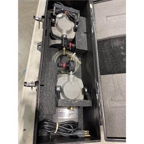 2 VACUUM PUMPS IN CASE