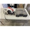 Image 1 : BLACK AND DECKER CIRCULAR SAW AND WAGNER CORDLESS DRILL IN CASE
