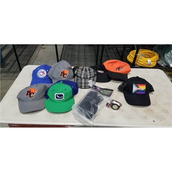 BOX OF BALL CAPS AND NEW WATCH