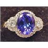 Image 1 : 14K WHITE GOLD LADIES DIAMOND AND TANZANITE RING -