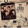 Image 1 : INXS signed The Swing album