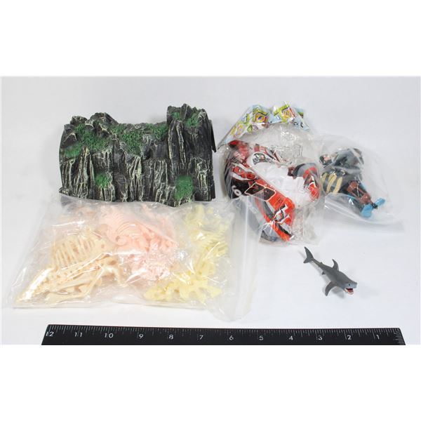BAG OF SMALL DINOSAUR SKELETON TOY MODELS