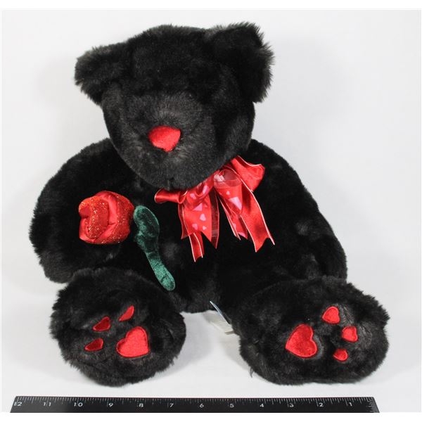 1 BLACK TEDDY BEAR WEARING A RED BOW TIE WITH PINK