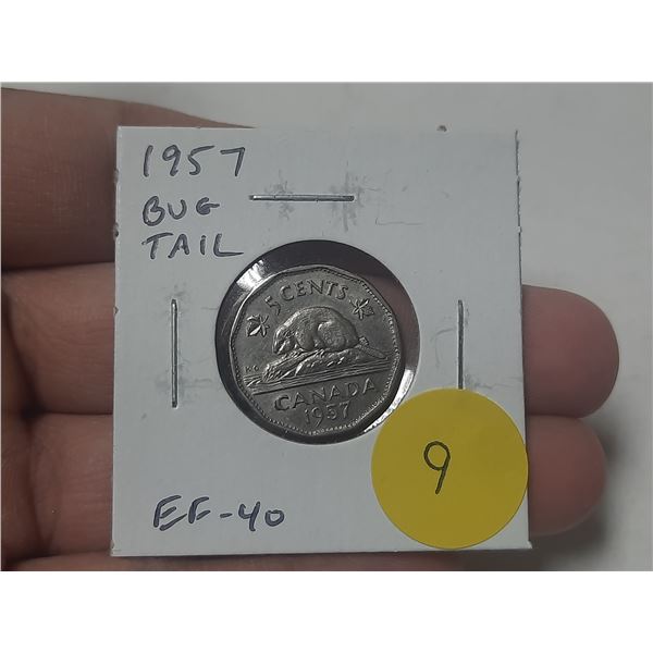 1957 Bug Tail Nickel 5 Cents. There is a small Die Chip on the end of the beaver’s tail tha