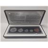 Image 1 : 1998 90th Anniversary coin set of the first coins struck in Canada. 5-coin set, 4 of which are Sterl