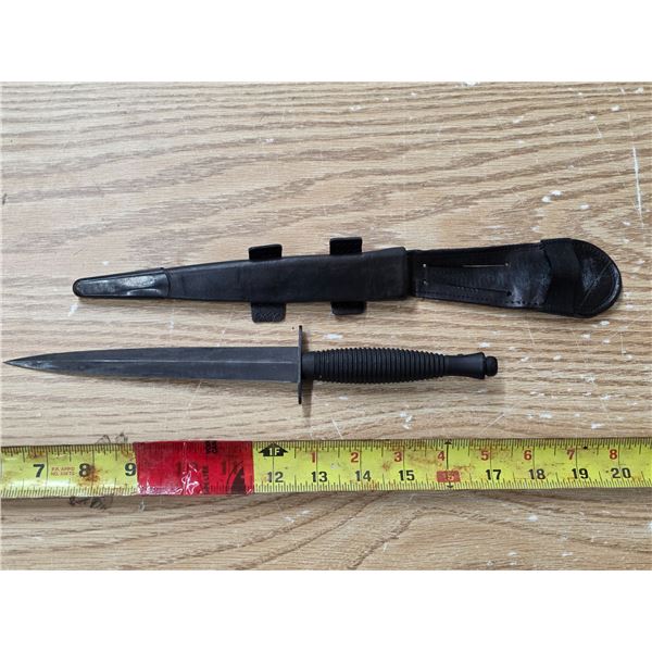 Knife with sheath- possible a diving knife