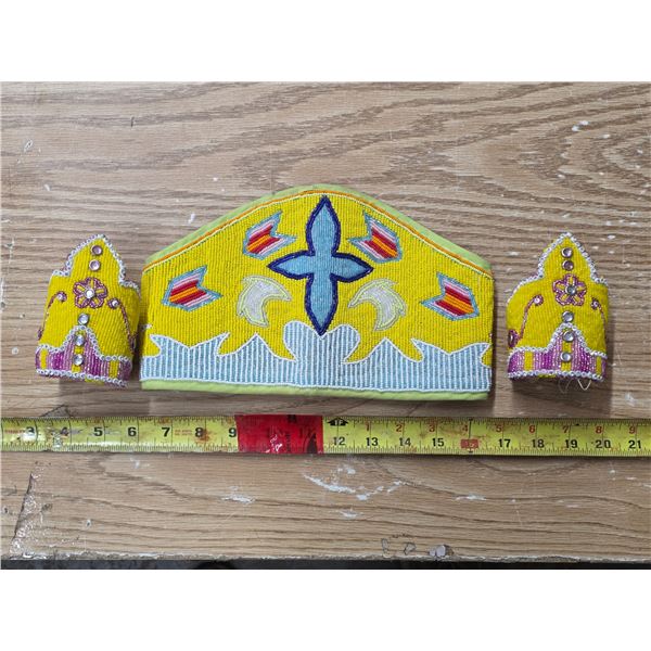 Indigenous beaded bracelets and head dress