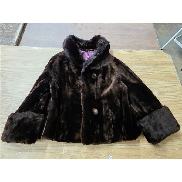 S.O woman's fur coat- 24"L
