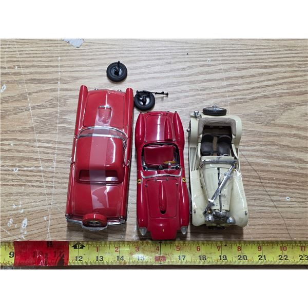 3 model cars- damaged- missing parts