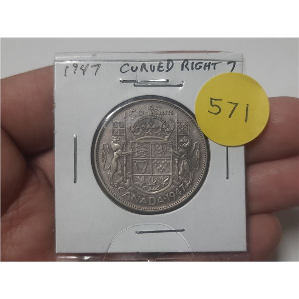 1947 Canadian Silver 50 Cents. Curved Right 7 variety. VF20.