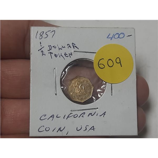 California. 1857 Half Dollar Gold. There is no Gold in this coin. AU.