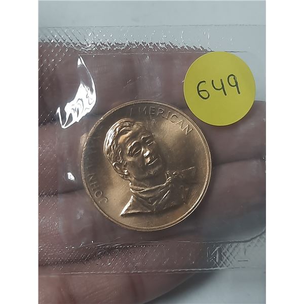 John Wayne medal. Housed in its original plastic.