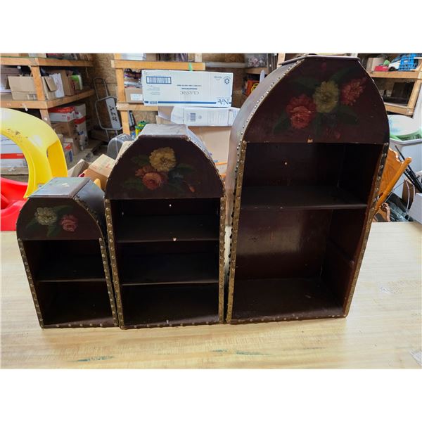 3 painted shelving units