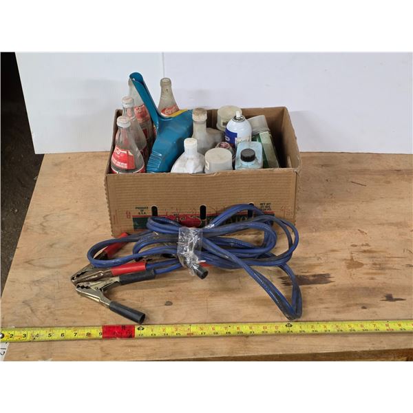 Coca cola bottles, jumper cables and cleaners