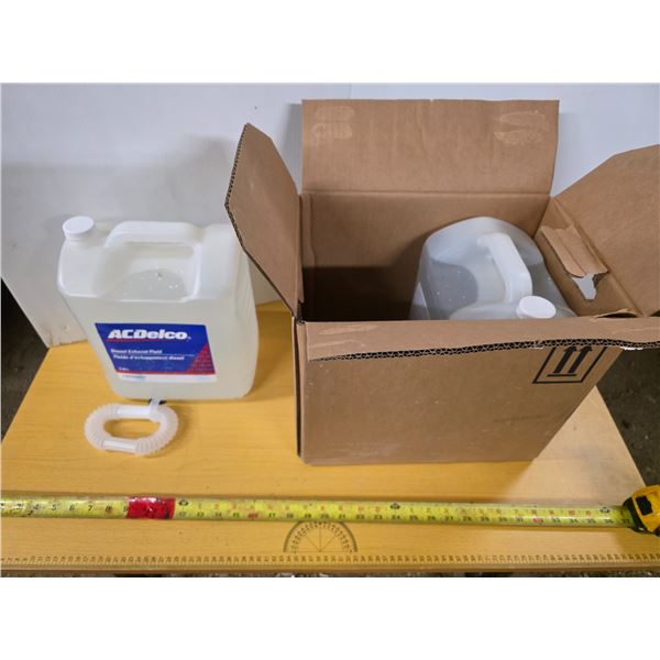 2 - 9L jugs of diesel exhaust fluid