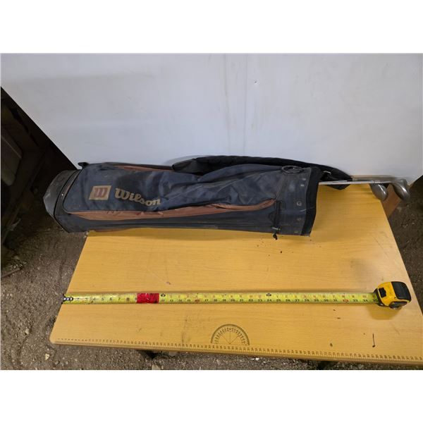 Wilson golf bag and 2 clubs